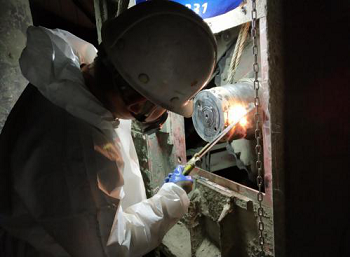 槽式输送机轴头磨损在线修复